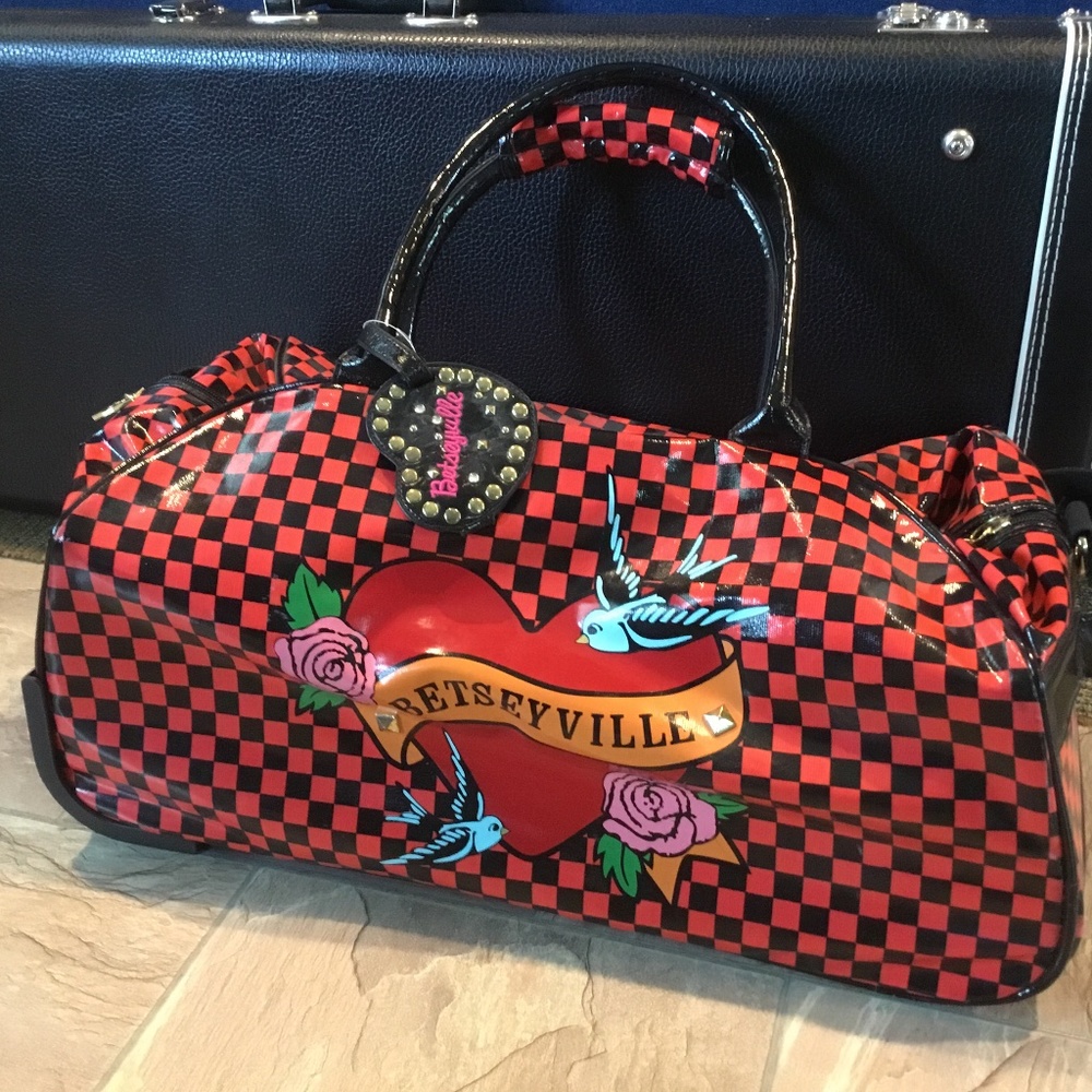 Rolling duffel Betseyville luggage